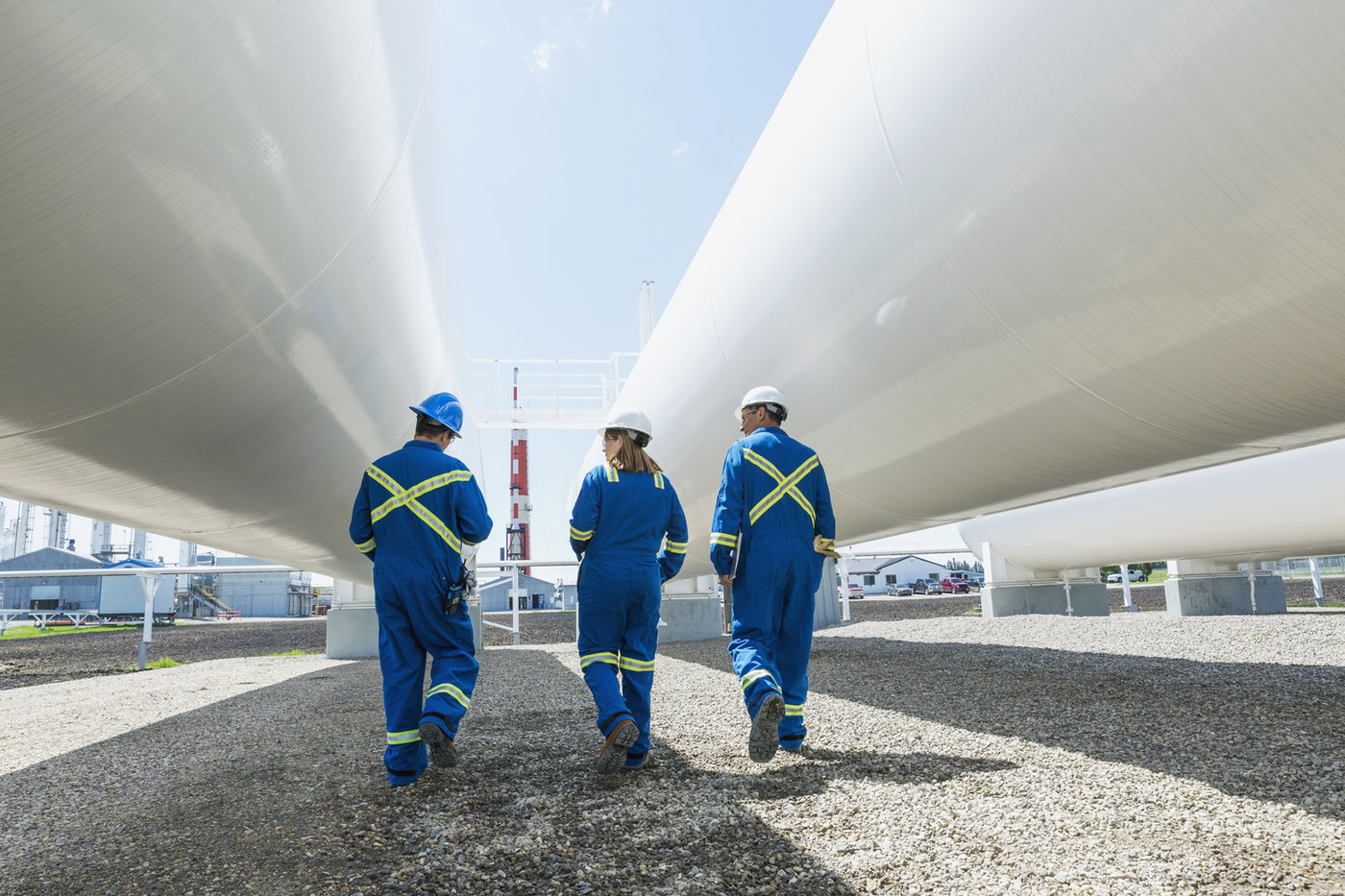 Workers at a gas plant